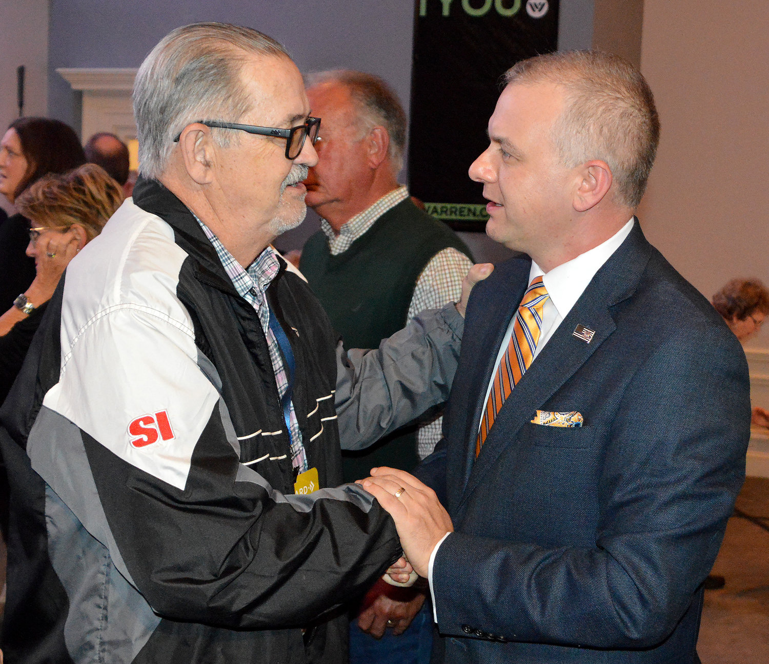 Jerry Cross, pastor of StraightForward Church, congratulates Josh Saefkow after he was elected president of the Georgia Baptist Convention at the 200th annual meeting of the GBC in Augusta, Ga., Tuesday, Nov. 15, 2022. (Index/Henry Durand)