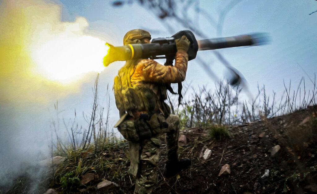 A Ukrainian soldier fires an anti-tank missile at an undisclosed location in the Donetsk region of Ukraine, Thursday, Nov. 17, 2022. (AP Photo/Roman Chop)