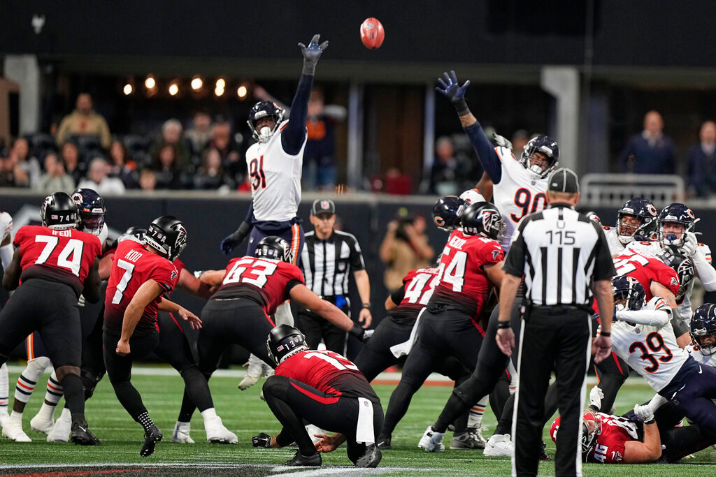 Atlanta Falcons place kicker Younghoe Koo (7) kicks a field goal against the Chicago Bears during the second half of an NFL football game, Sunday, Nov. 20, 2022, in Atlanta. (AP Photo/Brynn Anderson)