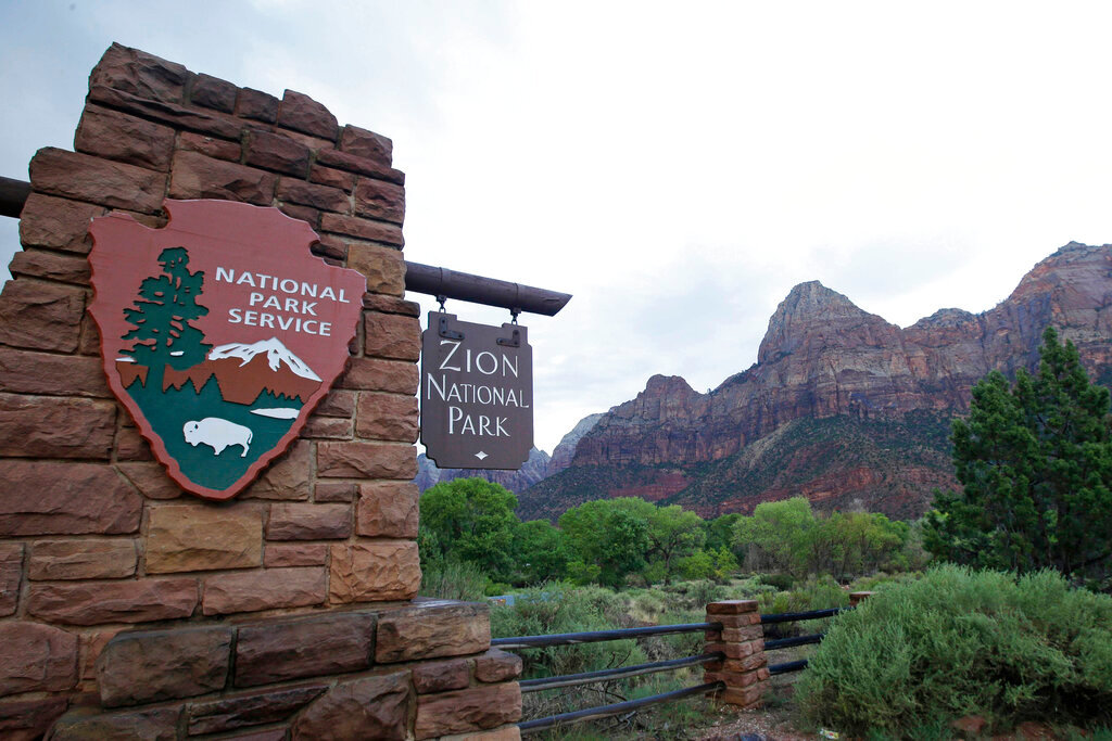 Zion National Park near Springdale, Utah, is pictured on Sept. 15, 2015. A woman died and a man was rescued and treated for hypothermia after they were caught in extreme cold weather while hiking in Utah's Zion National Park, officials said. (AP Photo/Rick Bowmer, File)
