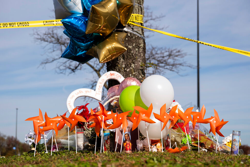 A memorial is set up outside of the Chesapeake, Va., Walmart on Thursday, Nov. 24, 2022.  Andre Bing, a Walmart manager, opened fire on fellow employees in the break room of the Virginia store, killing six people in the country’s second high-profile mass shooting in four days, police and witnesses said Wednesday. (Billy Schuerman/The Virginian-Pilot via AP)