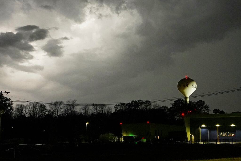 Lightning brightens the evening sky in Jackson, Miss., Tuesday, Nov. 29, 2022. (AP Photo/Rogelio V. Solis)