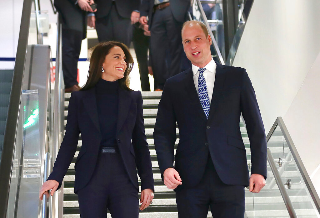 Britain's Prince William and Kate, Princess of Wales, arrive at Boston Logan International Airport, Wednesday, Nov. 30, 2022, in Boston. (John Tlumacki/The Boston Globe via AP)