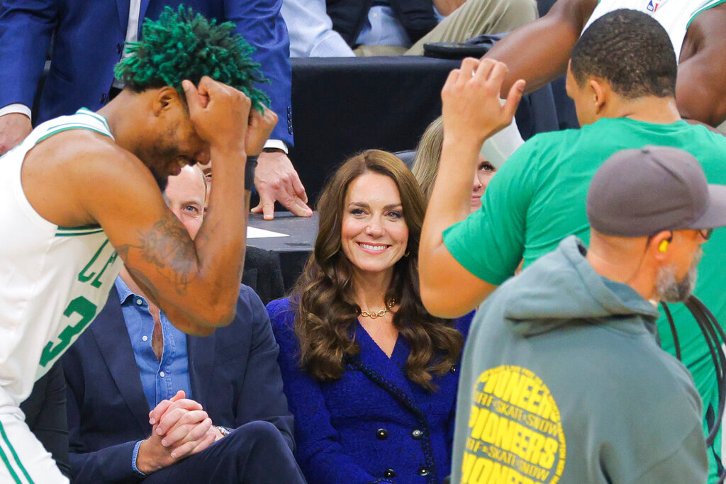Britain's Prince William, and Kate, Princess of Wales, attend an NBA basketball game between the Boston Celtics and the Miami Heat in Boston, Wednesday, Nov. 30, 2022. (Brian Snyder/Pool Photo via AP)