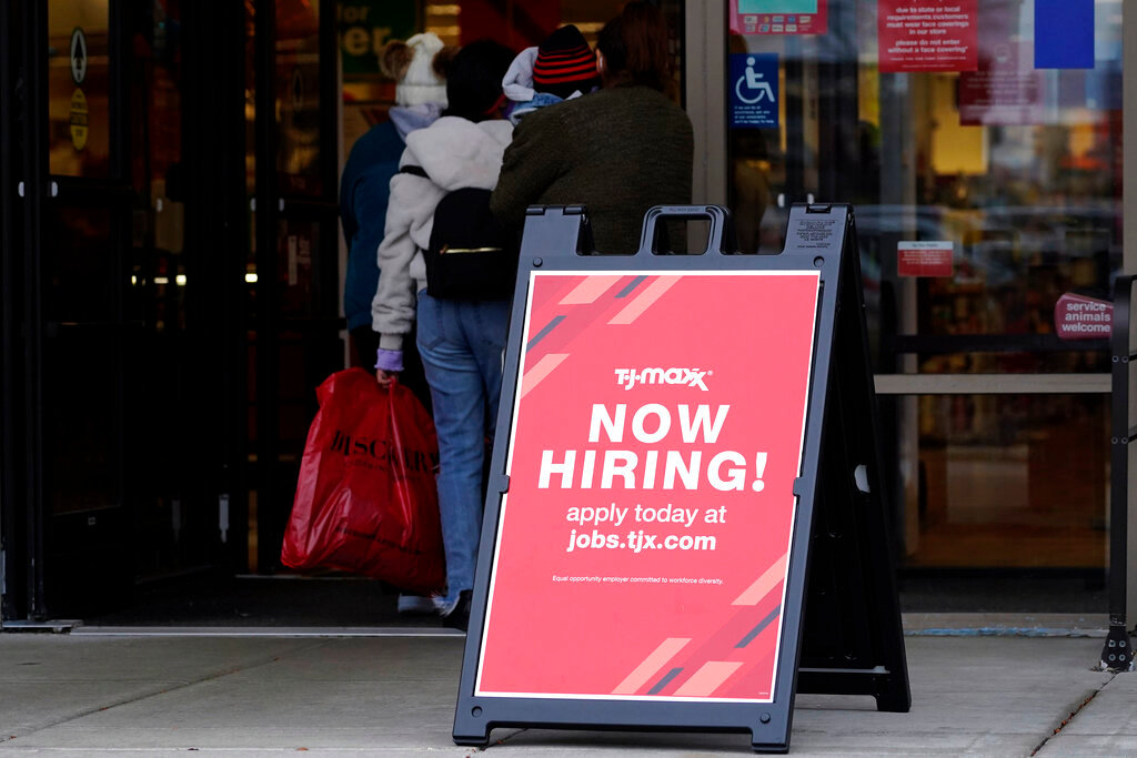 Hiring sign is displayed outside of a retail store in Vernon Hills, Ill., Saturday, Nov. 13, 2021. (AP Photo/Nam Y. Huh, File)