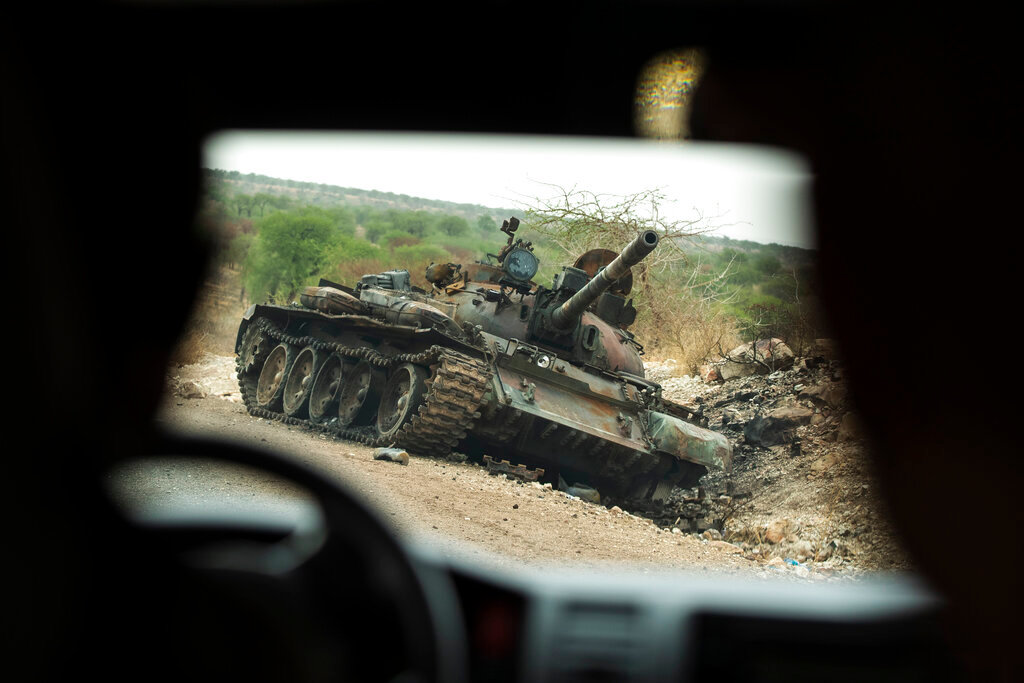 A destroyed tank is seen by the side of the road south of Humera, in an area of western Tigray annexed by the Amhara region during the ongoing conflict, in Ethiopia, on May 1, 2021. (AP Photo/Ben Curtis, File)