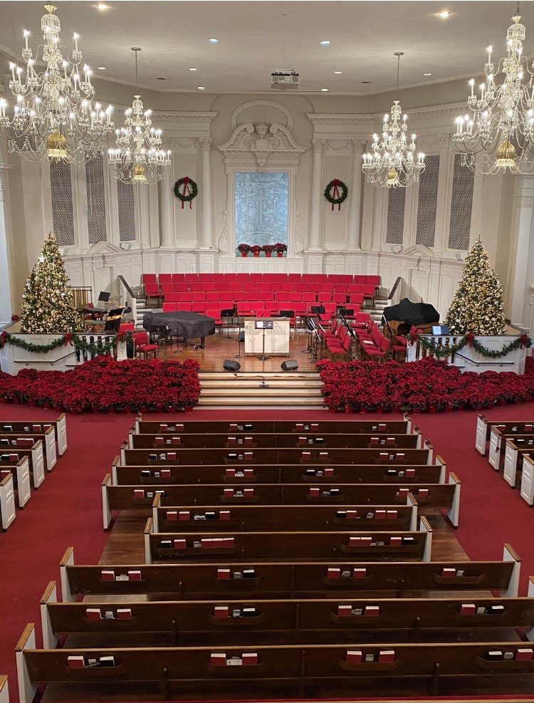 Newnan’s First Baptist Church is adorned with 175 poinsettias as a part of its Christmas décor.