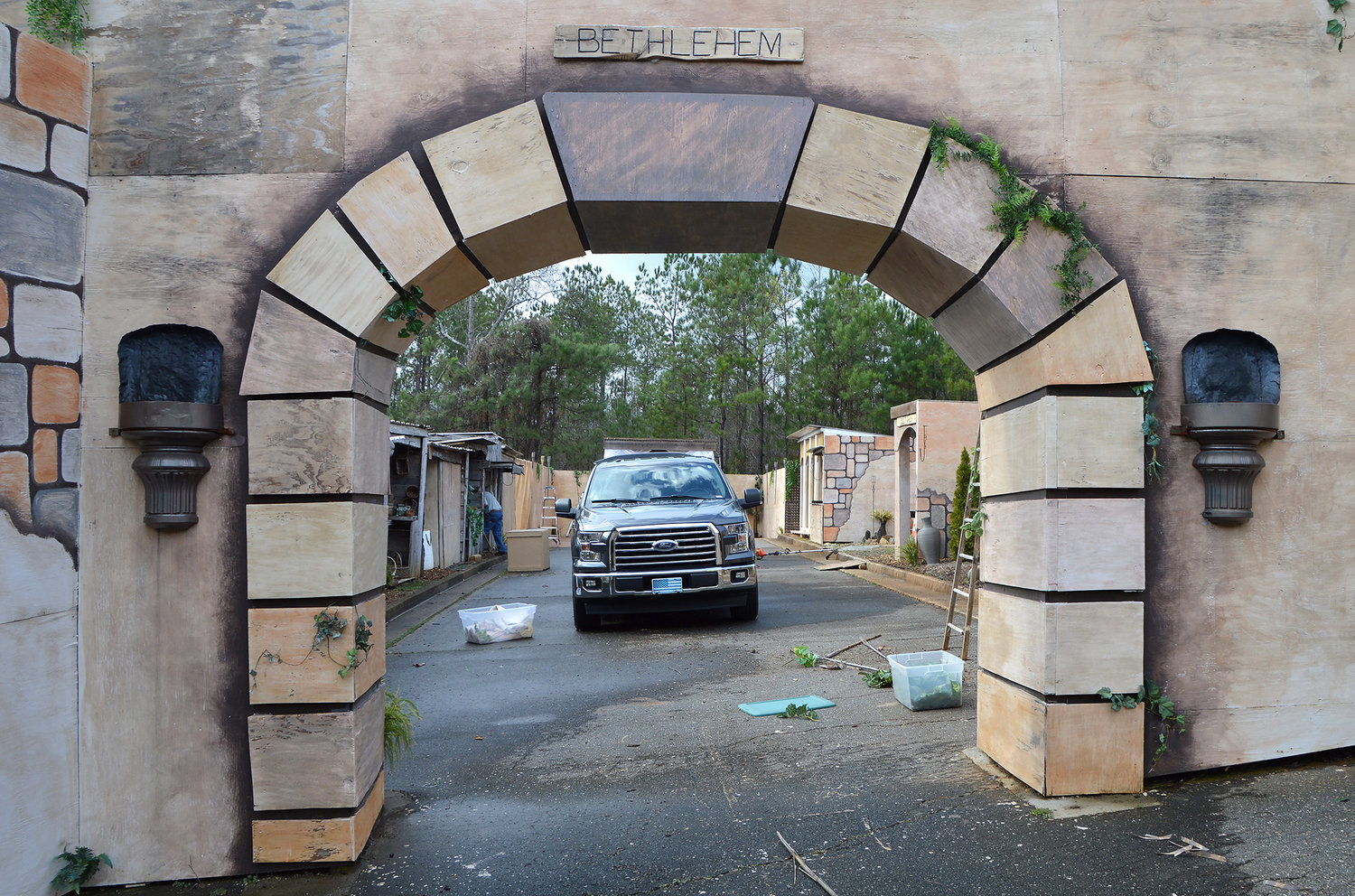 A truck is parked beyond the gate of the Bethlehem village set on the grounds of Legacy Baptist Church in Dallas, Ga., Thursday, Dec. 8, 2022, as final preparations are made for the Legacy of Bethlehem production. (Index/Henry Durand)