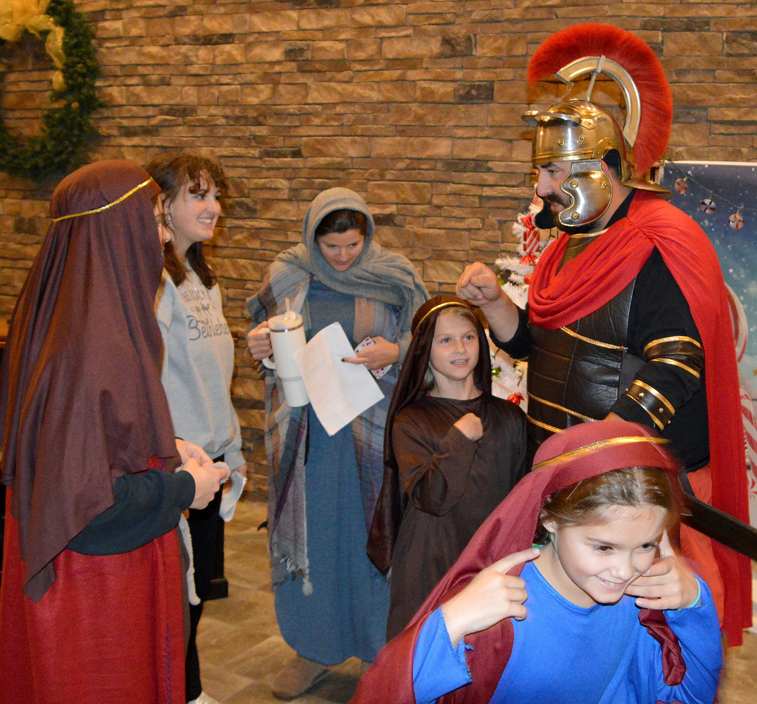 Tyler Kendall rehearses his lines as a Roman soldier in the Legacy of Bethlehem production at Legacy Baptist Church in Dallas, Ga., Monday, Dec. 5, 2022. The dress rehearsal was held indoors due to the rain. (Index/Henry Durand)