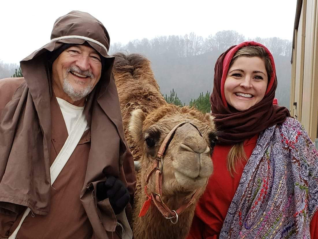 Jim Yearwood poses with his daughter Amber Harrell and a camel during a prior year's production of the Legacy of Bethlehem at Legacy Baptist Church in Dallas, Ga. (Photo/Courtesy Jim Yearwood)