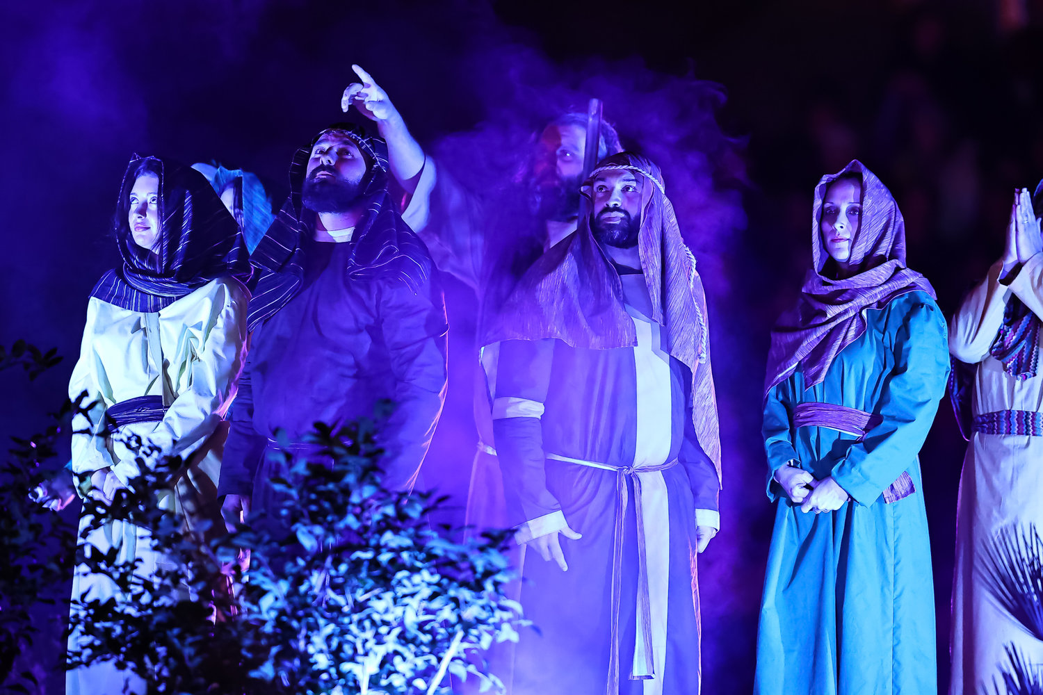 From left, Cali Hutto playing Noah’s daughter-in-law, Trey Messser playing Noah’s son, Nick Veal as Noah, Joe Frye as Noah’s son, and Jessica Stone as Noah’s daughter-in-law all look on as God establishes His new covenant with Noah. (Photo/Garrett Pelt)