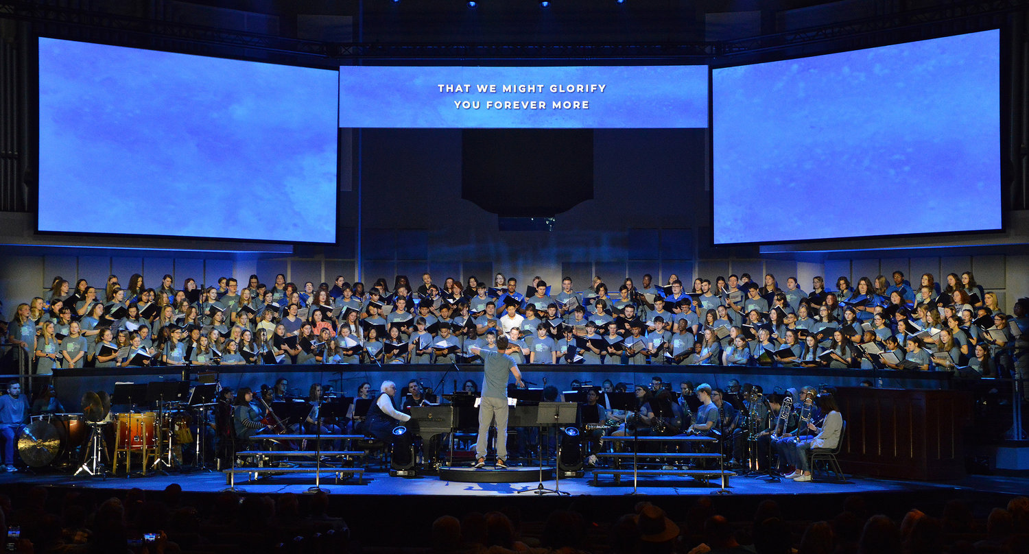 Dan Baker, minister of music at First Baptist Church of Amarillo, Texas, directs the choir during a worship concert at the conclusion of REEL Fest 2023 held at First Baptist Church of Jonesboro, Ga., Saturday, Jan. 21, 2023. (Index/Henry Durand)
