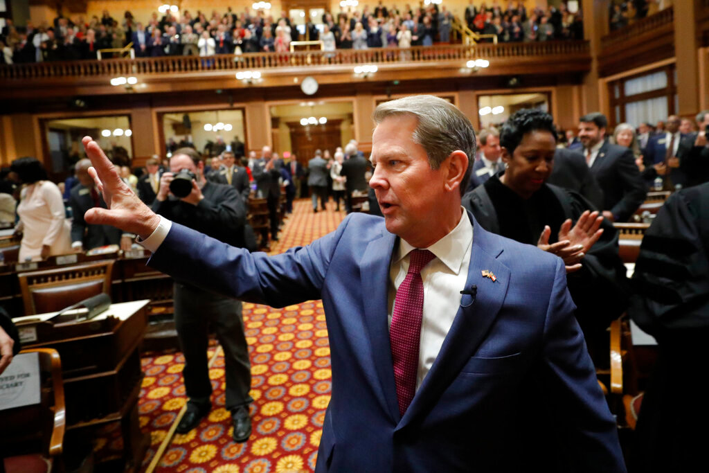 Gov. Brian Kemp arrives for the State of the State address on the House floor of the state Capitol on Wednesday, Jan. 25, 2023, in Atlanta. (AP Photo/Alex Slitz)