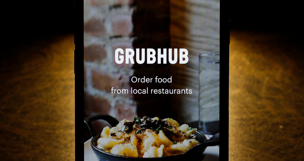 The Grubhub app is shown on an iPhone. (AP Photo/Charles Rex Arbogast, File)