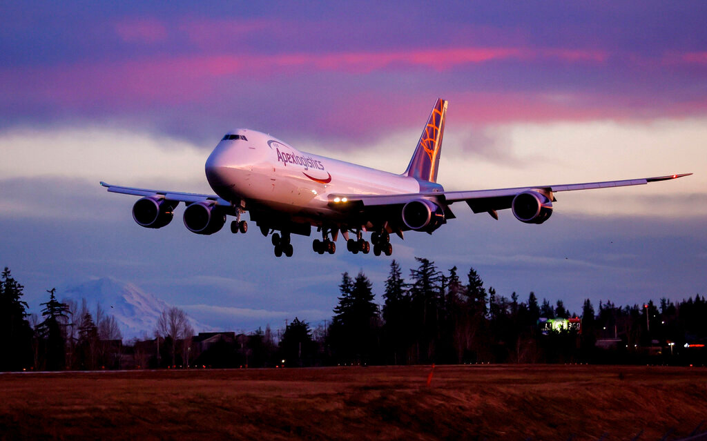 The final Boeing 747 lands at Paine Field following a test flight, Tuesday, Jan. 10, 2023, in Everett, Wash. (Jennifer Buchanan/The Seattle Times via AP)