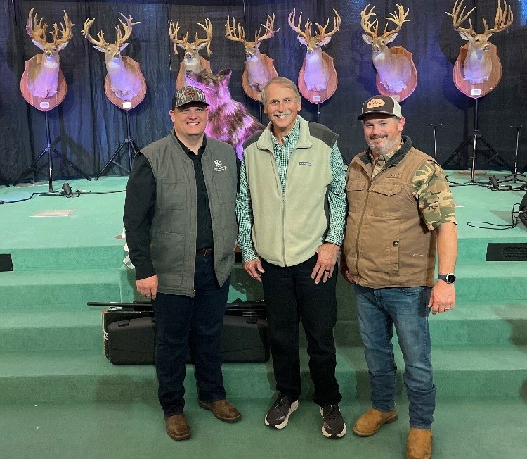 Blackshear First Baptist Church Pastor Justin Gambrell, outdoor legend Hank Parker, and the church's men's ministry leader David Dowling pose for a photo at a venison supper held on January 20.