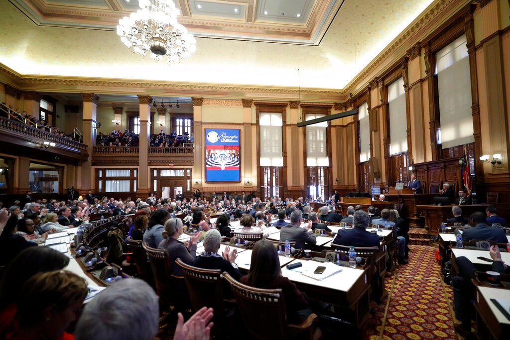 Georgia Gov. Brian Kemp delivers the State of the State address on the House floor of the state Capitol on Wednesday, Jan. 25, 2023, in Atlanta. (AP Photo/Alex Slitz)