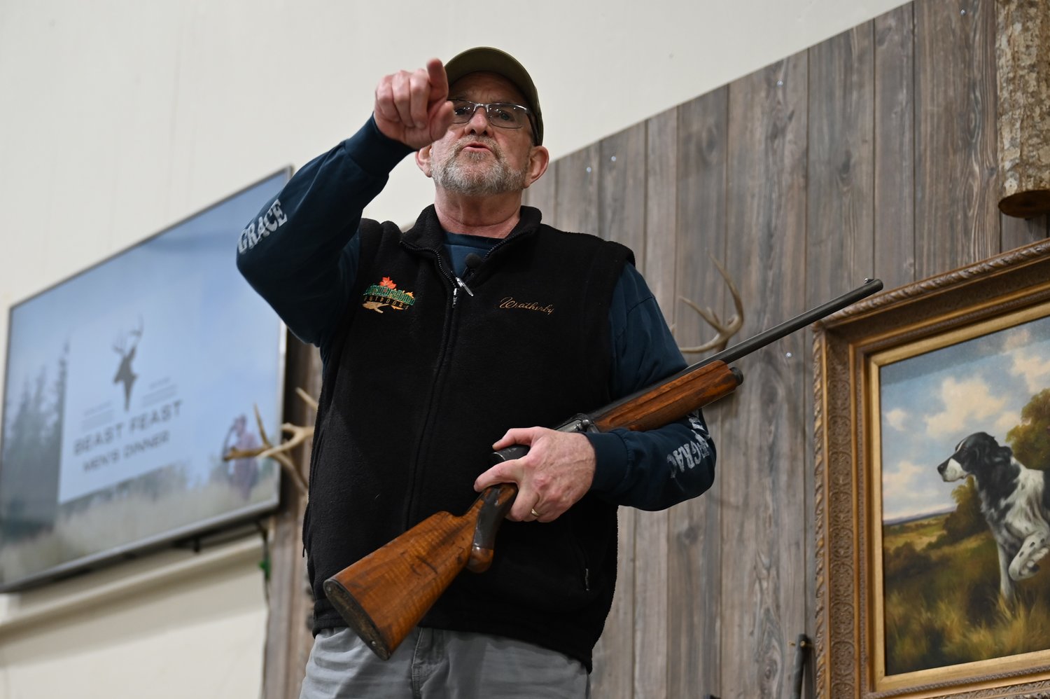 Outdoorsman Chuck McAlister shares the gospel with fellow hunters and fishermen on Friday, February 3, 2023, at a wild game dinner at Bethel Baptist Church in Omega. (Index/Roger Alford)