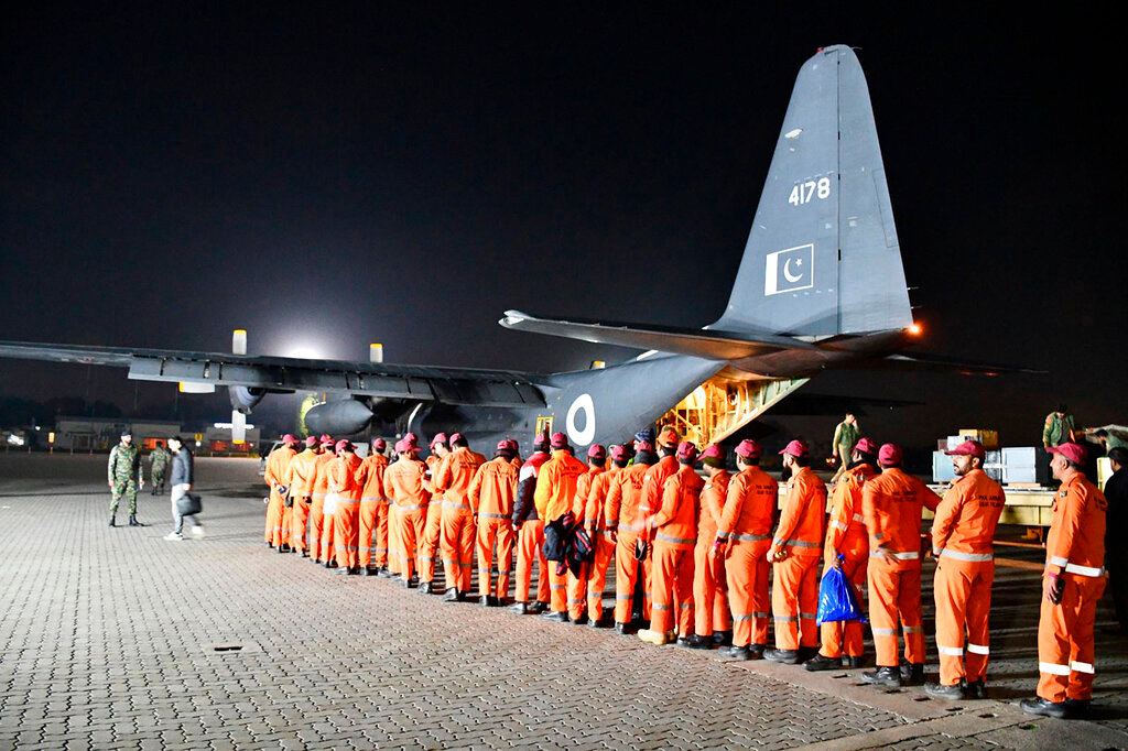 Pakistani Army Urban Search and Rescue team members board a plane for departure to Turkey at Nur Khan airbase in Rawalpindi, Pakistan, Tuesday, Feb. 7, 2023. (Inter Services Public Relations vis AP)