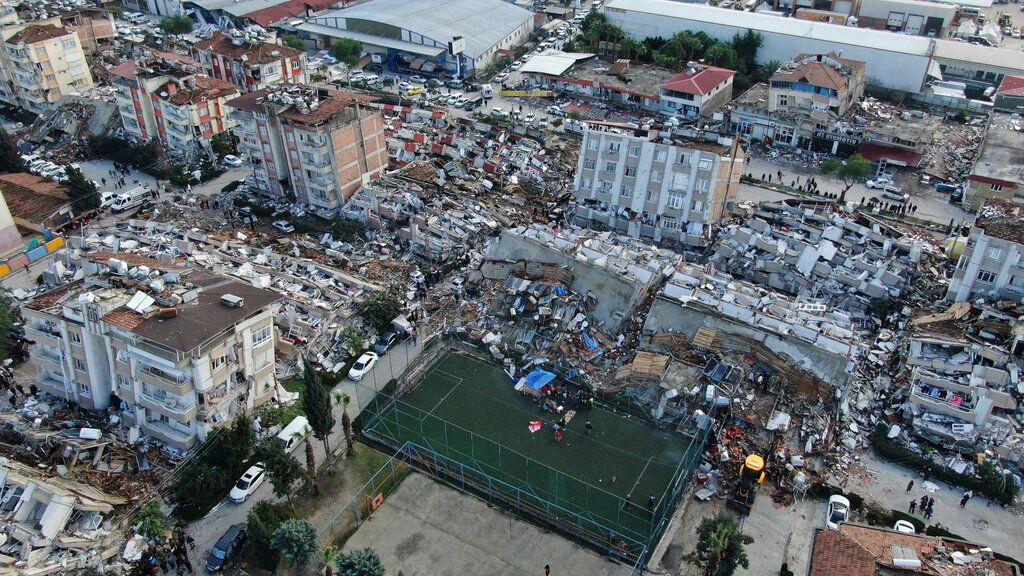 Aerial photo shows the destruction in Hatay city center, southern Turkey, Tuesday, Feb. 7, 2023. (IHA via AP)