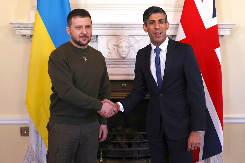 Ukraine's President Volodymyr Zelenskyy meets Britain's Prime Minister Rishi Sunak, right, inside Downing Street in London, Wednesday, Feb. 8, 2023. (Dan Kitwood/Pool via AP)