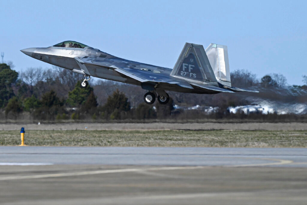 A U.S. Air Force F-22 Raptor takes off from Joint Base Langley-Eustis, Va., Saturday, Feb. 4, 2023. (Airman 1st Class Mikaela Smith/U.S. Air Force via AP)