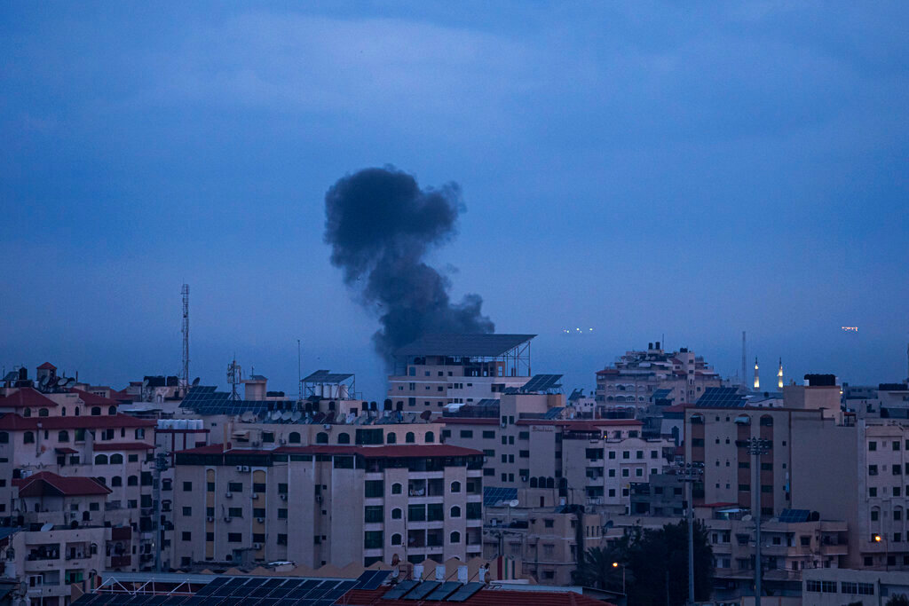 Smoke rises following an Israeli airstrike in the western Gaza Strip, Thursday, Feb. 23, 2023. (AP Photo/Fatima Shbair)