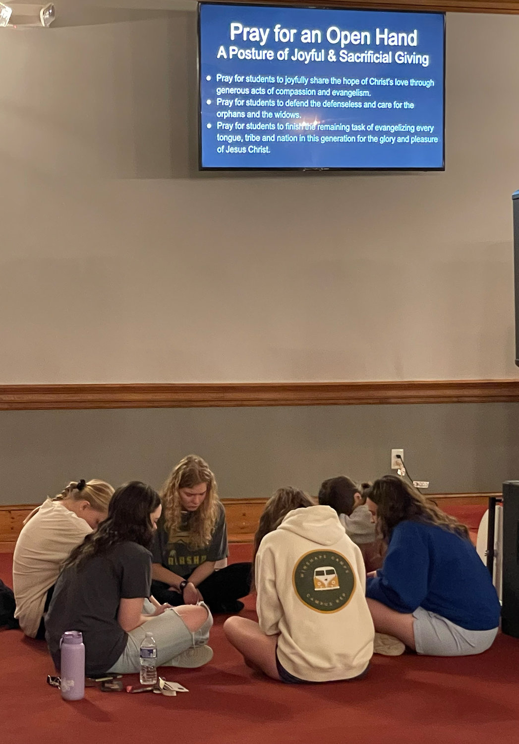 Students pray during a Collegiate Day of Prayer event at UNG Dahlonega, Thursday, Feb. 23, 2023.
