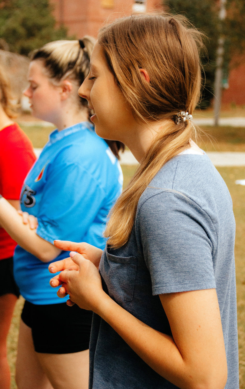 A student prays during a Collegiate Day of Prayer event at Georgia Southern University's Armstrong Campus in Savannah, Ga., Thursday, Feb. 23, 2023.