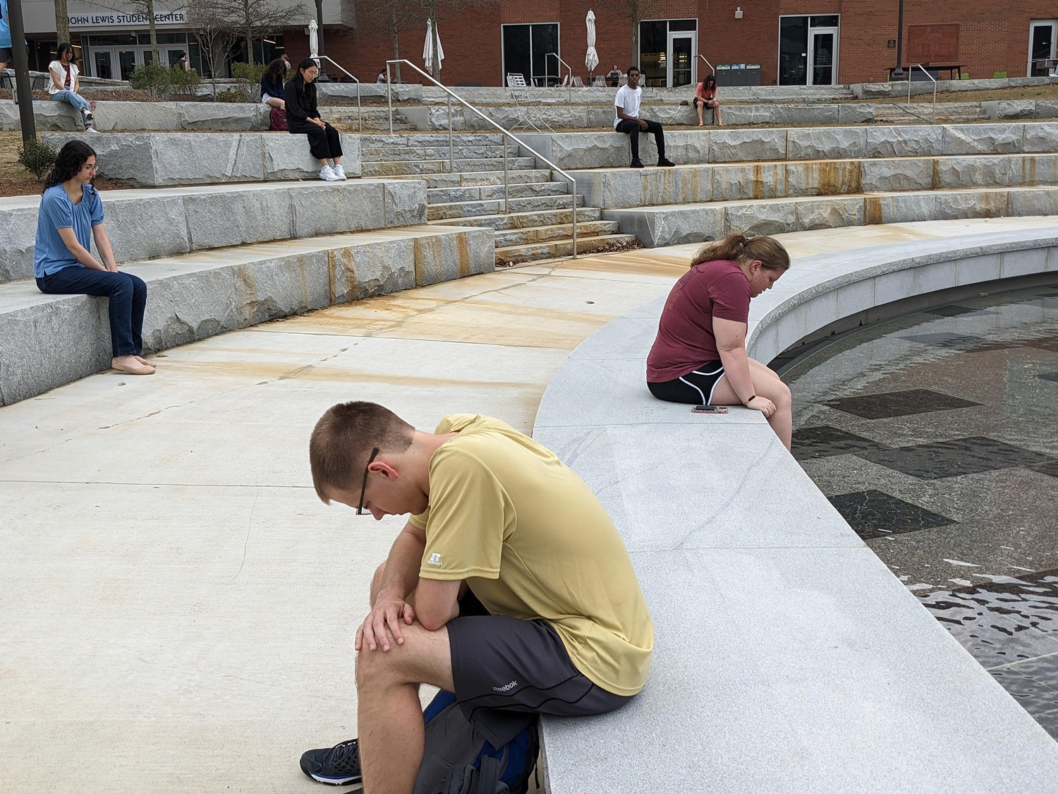 Students pray outside the student center during a Collegiate Day of Prayer event at Georgia Tech, Thursday, Feb. 23, 2023.