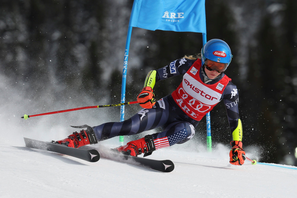 United States' Mikaela Shiffrin speeds down the course during a women's World Cup giant slalom race, in Are, Sweden, Friday, March 10, 2023. (AP Photo/Alessandro Trovati)