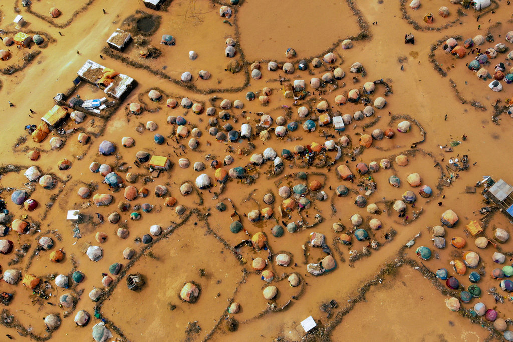 Huts made of branches and cloth provide shelter to Somalis displaced by drought on the outskirts of Dollow, Somalia, Sept. 19, 2022. (AP Photo/Jerome Delay, File)