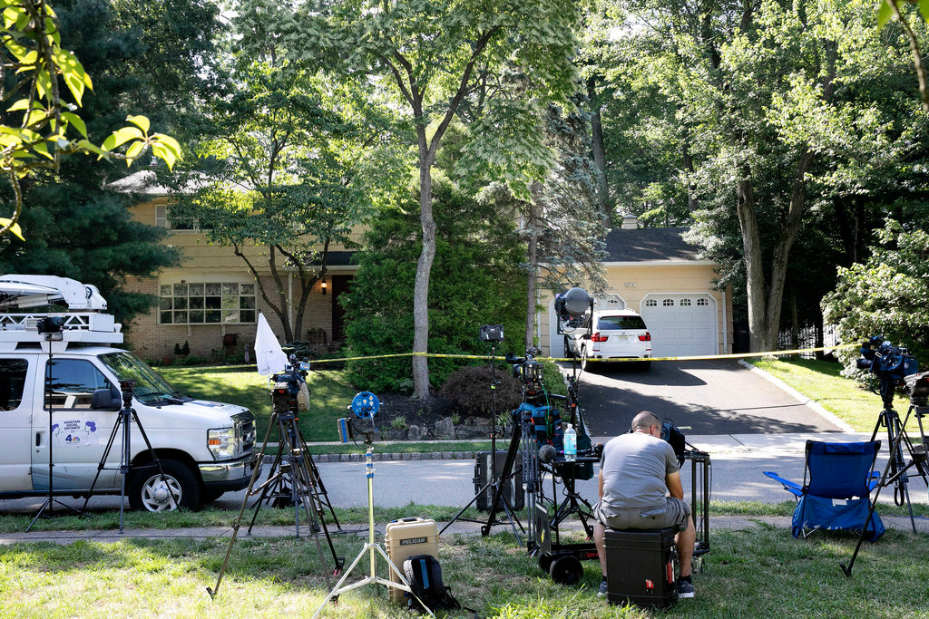 News media sets up in front of the home of U.S. District Judge Esther Salas on July 20, 2020, in North Brunswick, N.J. (AP Photo/Mark Lennihan, File)