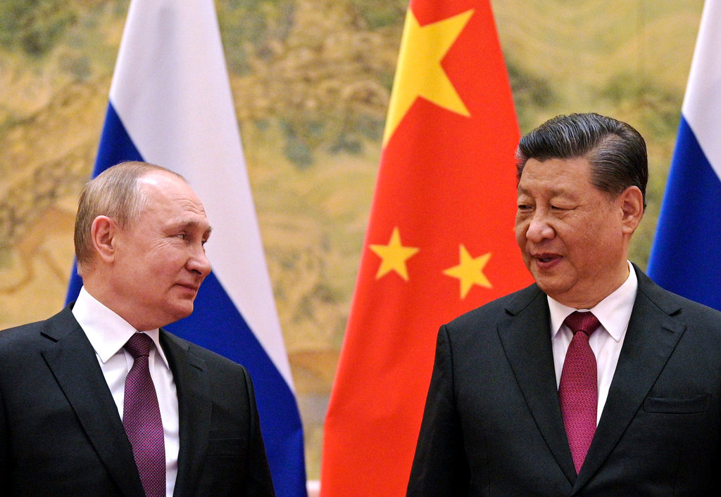 Chinese President Xi Jinping, right, and Russian President Vladimir Putin meet in Beijing, China on Feb. 4, 2022. (Alexei Druzhinin, Sputnik, Kremlin Pool Photo via AP, File)
