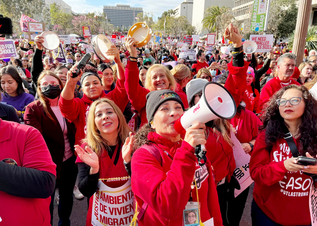 Sylvia Garcia, from Bassett Street Elementary, talks as she and other teachers attend a Los Angeles Unified School District and Service Employees International Union 99 (SEIU) rally in Grand Park in downtown Los Angels, Wednesday, March 15, 2023. (Francine Orr/Los Angeles Times via AP)