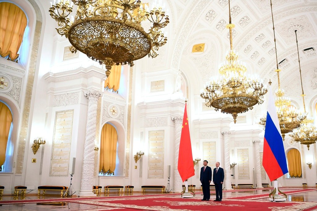 Russian President Vladimir Putin, right, and Chinese President Xi Jinping attend an official welcome ceremony at The Grand Kremlin Palace in Moscow, Tuesday, March 21, 2023. (Alexey Maishev, Sputnik, Kremlin Pool Photo via AP)