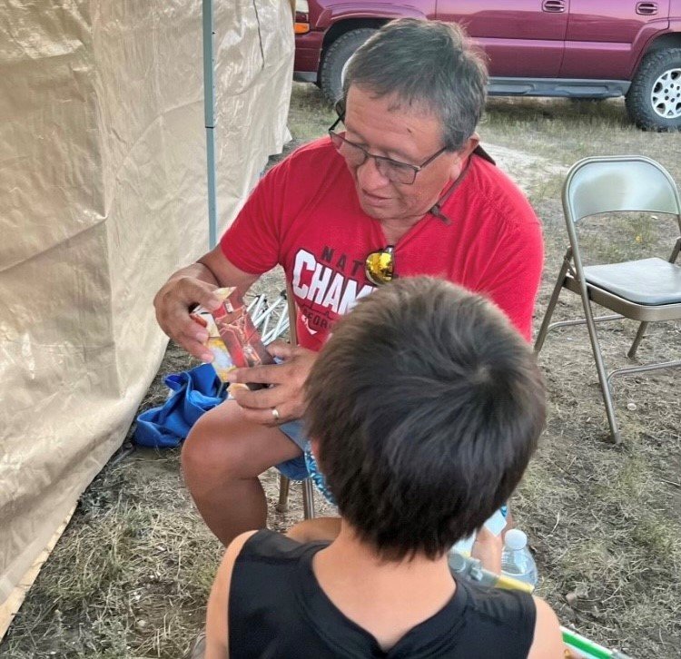 Will Ashley, a member of First Baptist Church in Jonesboro, uses an Evangecube to explain the gospel during a mission trip to Montana last year.