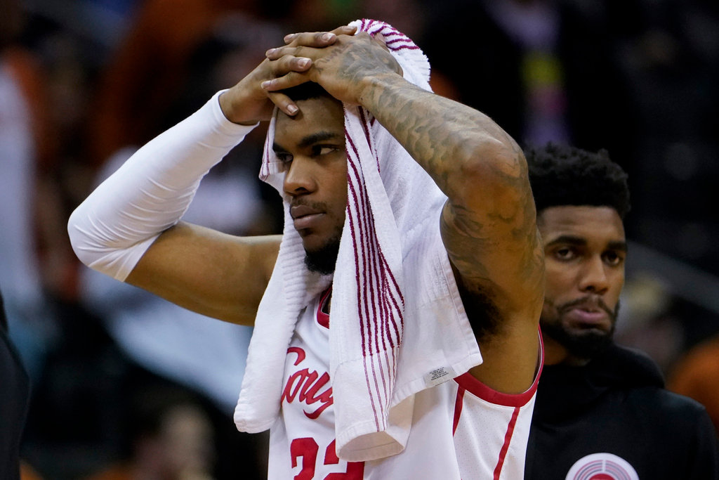 Houston forward Reggie Chaney leaves the court after their loss against Miami in a Sweet 16 game Friday, March 24, 2023, in Kansas City, Mo. (AP Photo/Jeff Roberson)