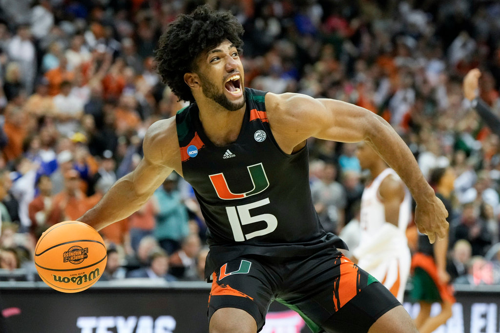 Miami forward Norchad Omier celebrates after their win against Texas in an Elite 8 game in the Midwest Regional of the NCAA Tournament Sunday, March 26, 2023, in Kansas City, Mo. (AP Photo/Jeff Roberson)