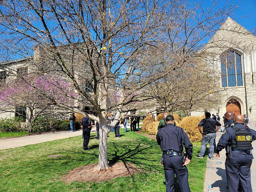 Metro Nashville Police Department officers respond to an active shooter at Covenant School, Covenant Presbyterian Church, in Nashville, Tenn. Monday, March 27, 2023. (Metro Nashville Police Department via AP)
