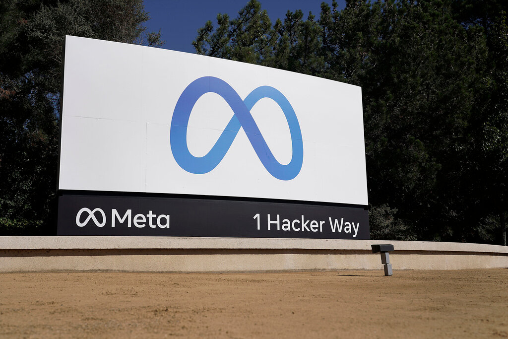 Facebook's Meta logo sign is seen at the company headquarters in Menlo Park, Calif., Oct. 28, 2021. (AP Photo/Tony Avelar, File)
