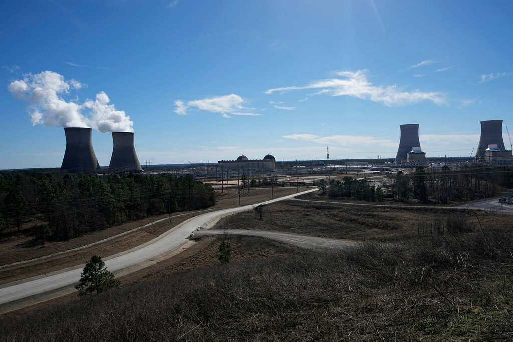 Georgia Power Co.'s Plant Vogtle nuclear power plant is seen, Jan. 20, 2023, in Waynesboro, Ga., with two older reactors on the left and two new reactors on the right. (AP Photo/John Bazemore, File)