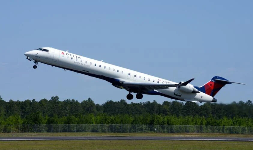 The first Delta Connection CJR-900 to call on the Brunswick Golden Isles Airport lifts off from the runway as it departs on its return flight to Atlanta. (Brunswick News/Terry Dickson)