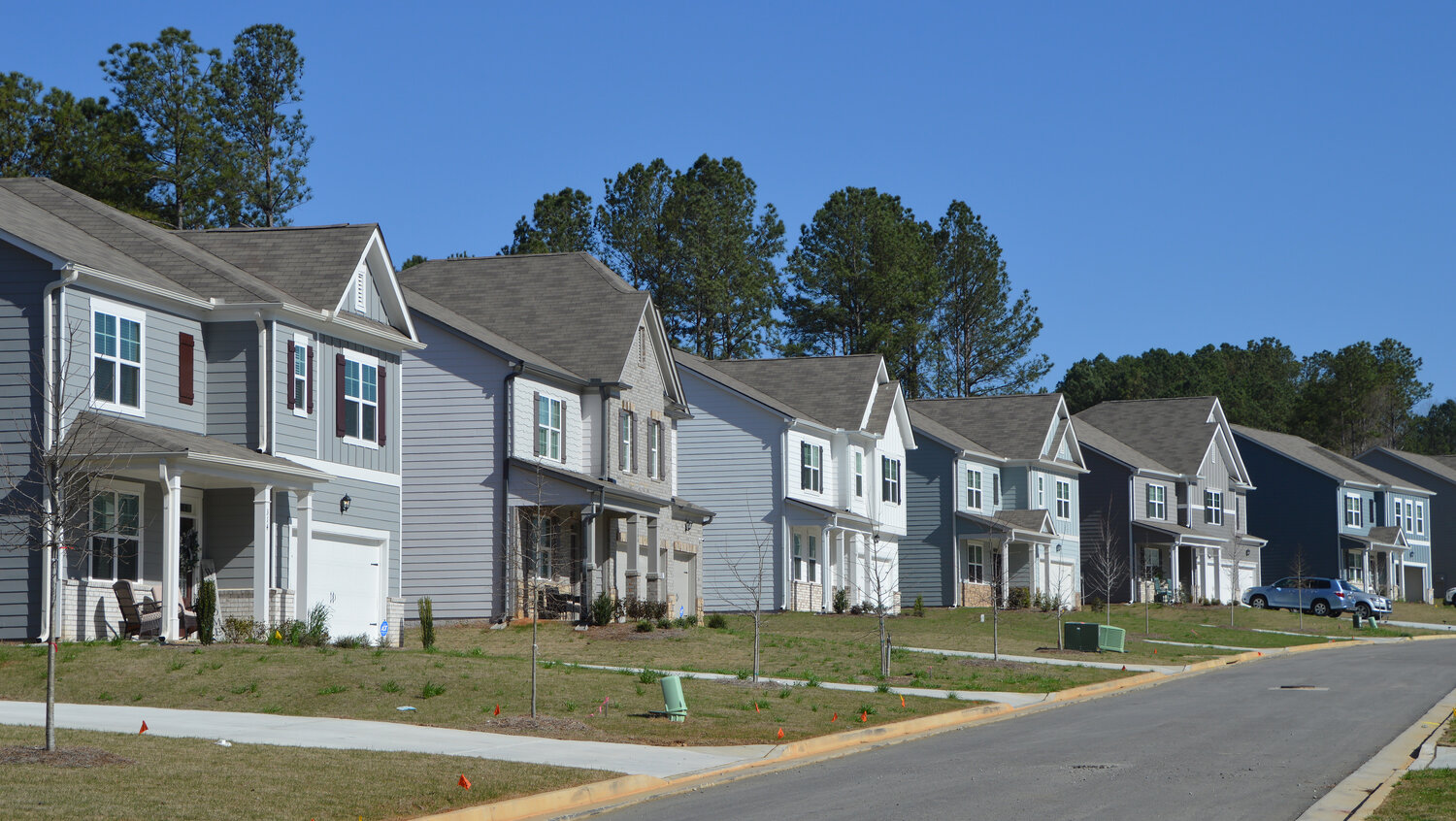 A row of newly-built homes in Dallas, Ga. The National Association of Realtors says U.S. home sales sank 23.2% compared with April last year. (Index/Henry Durand)