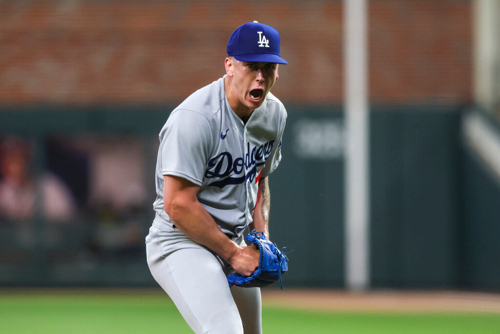 Los Angeles Dodgers starting pitcher Bobby Miller reacts after striking out Atlanta Braves' Matt Olson to end the fifth inning Tuesday, May 23, 2023, in Atlanta. The Dodgers won 8-1. (Jason Getz/Atlanta Journal-Constitution via AP)