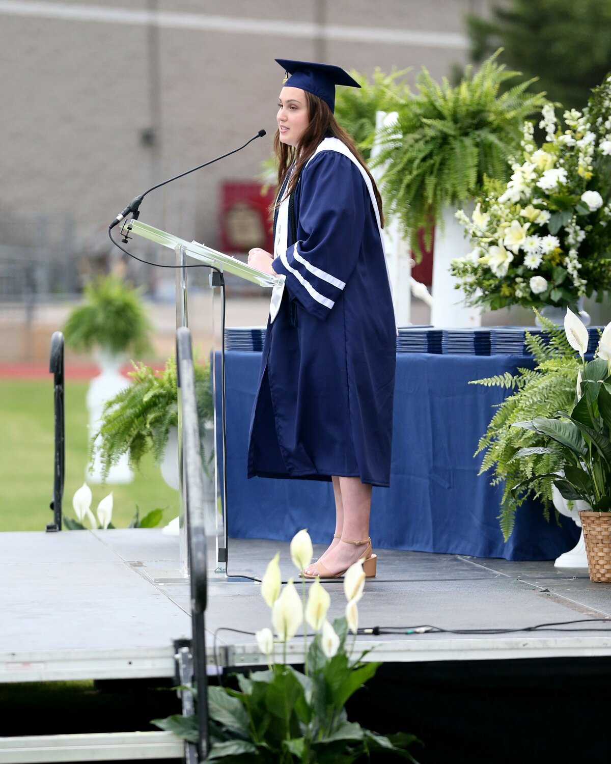 Melanie Collier speaks to her classmates at Eagle's Landing Christian Academy in McDonough, Ga. on Friday, May 19, 2023.(Photo/Jeff Hurndon)