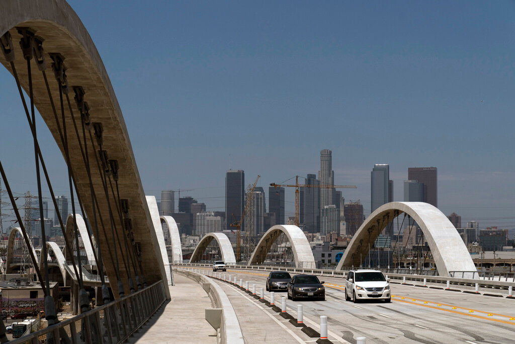 Cars move along the 6th Street Viaduct in Los Angeles, July 27, 2022. (AP Photo/Jae C. Hong, File)