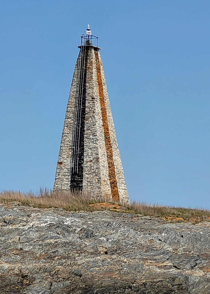 Little Mark Island and Monument stands between Broad Sound and Casco Bay, May 11, 2023, off the coast off Harpswell, Maine. (Barbara Salfity/General Services Administration via AP)
