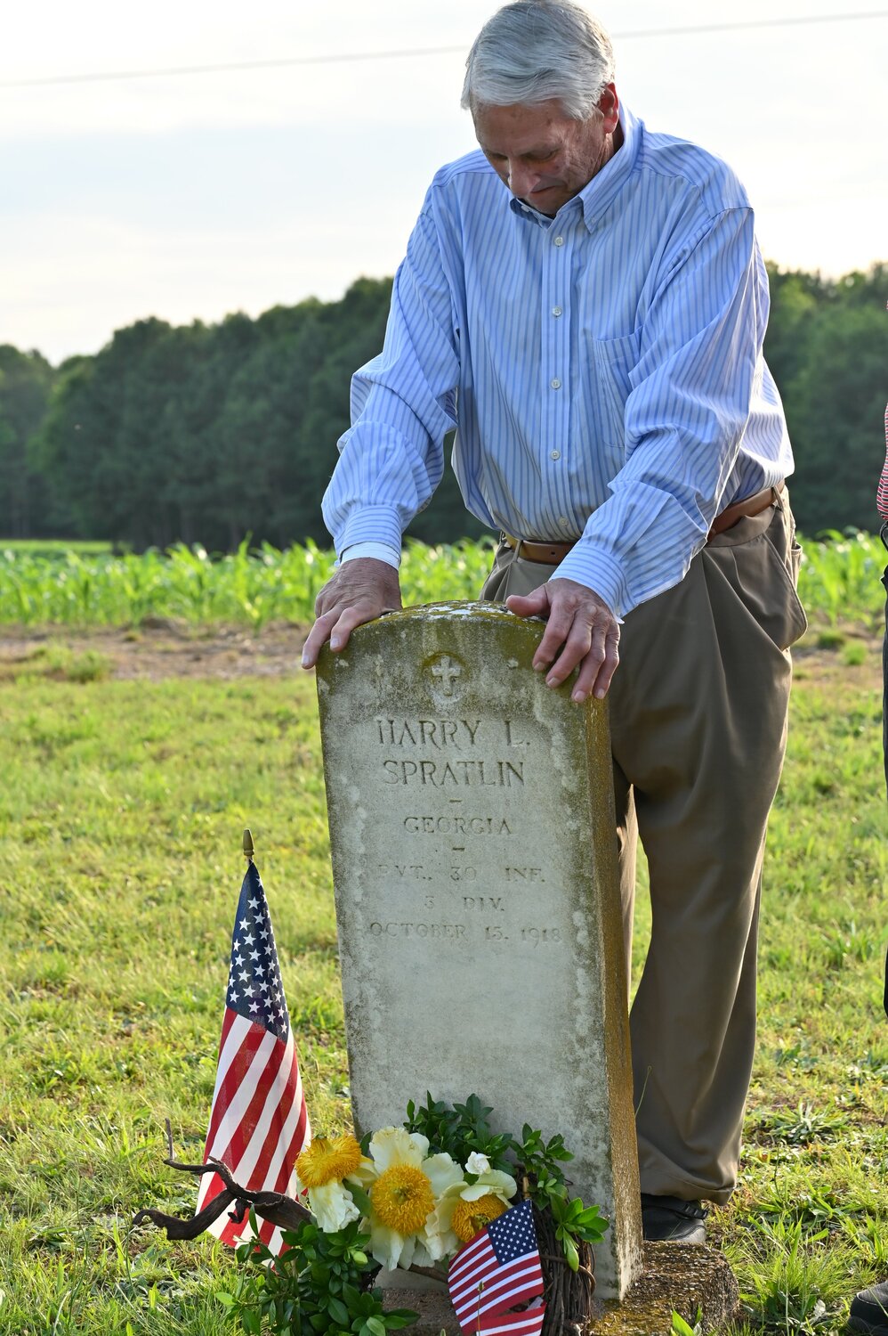 Morris Bullock stands over the grave of his great, great uncle, Private Harry Spratlin. (Index/Roger Alford)