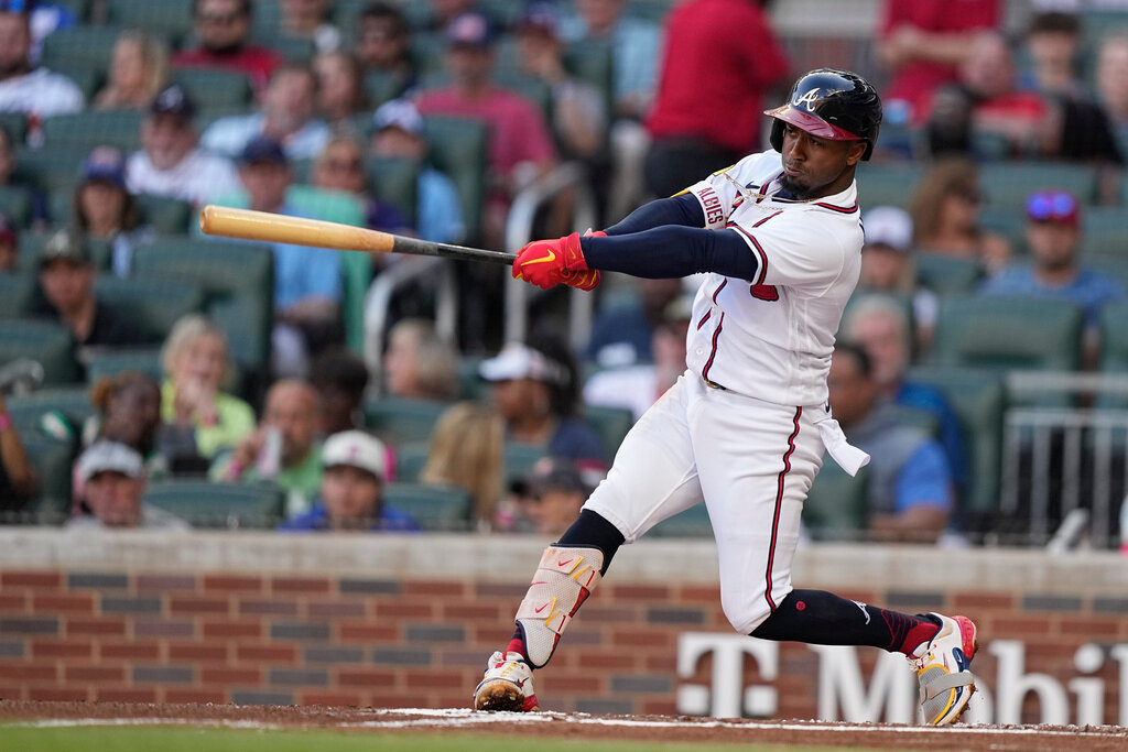 Atlanta Braves' Ozzie Albies drives in two runs in the first inning against the Philadelphia Phillies, Sunday, May 28, 2023, in Atlanta. (AP Photo/Brynn Anderson)